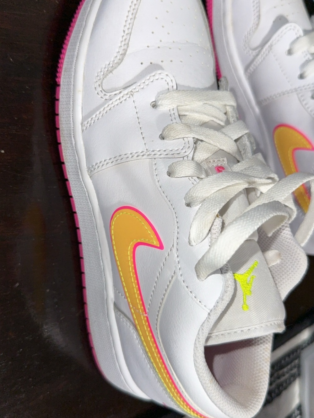 Nike Kids White Sneakers with Yellow and Pink Swoosh